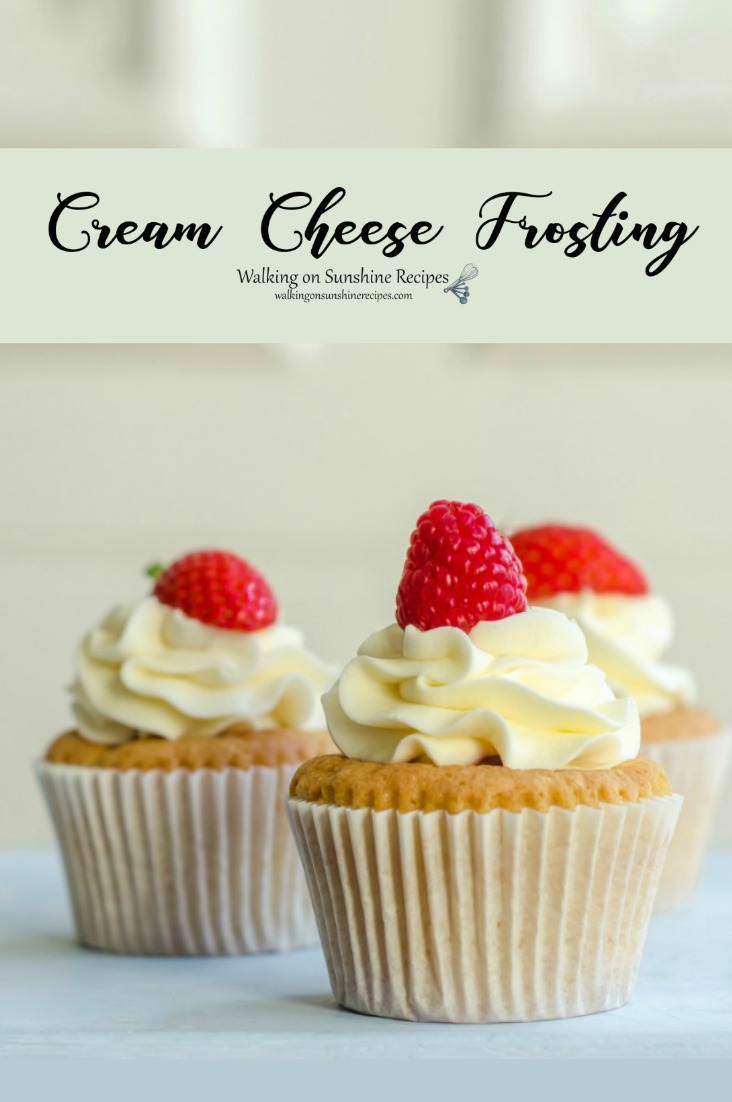 3 cupcakes with Easy Homemade Cream Cheese Frosting and fresh raspberries.