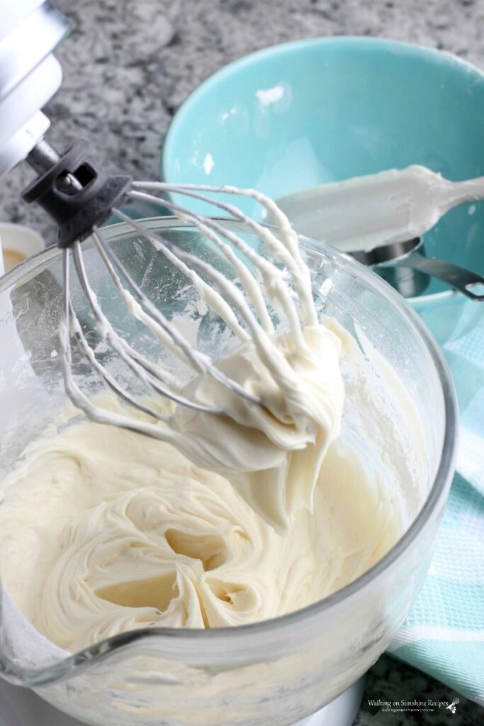 Homemade Cream Cheese Frosting in mixer.
