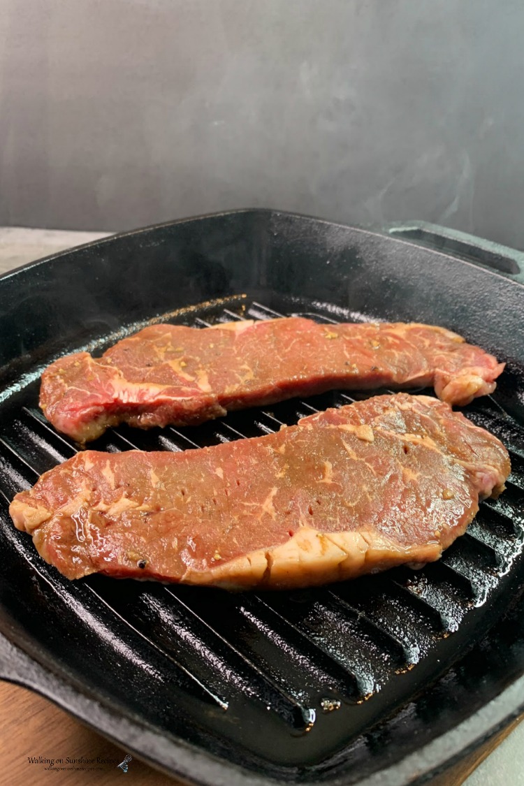 Place steaks in cast iron grill pan
