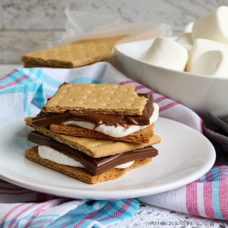 S'mores made in the air fryer on white plate. 