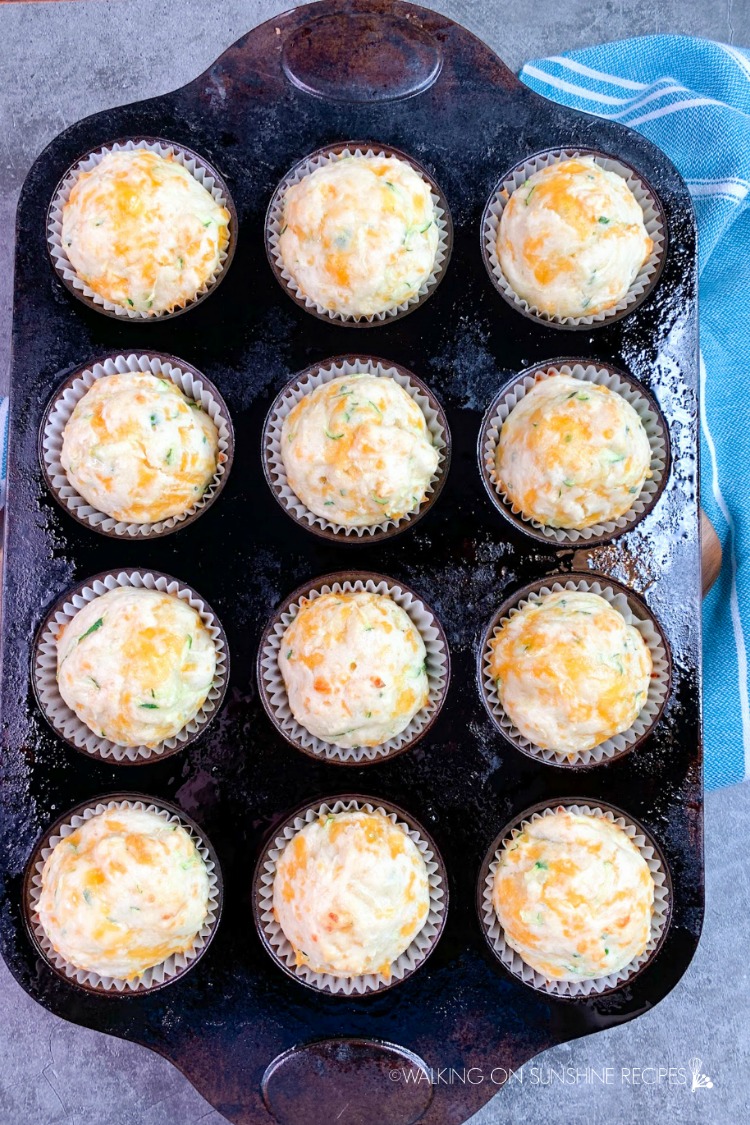 Baked Zucchini Cheese Muffins in baking pan