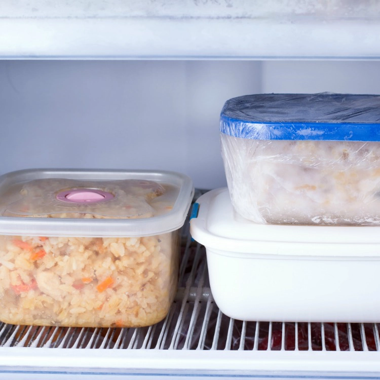 3 containers with frozen meals. 