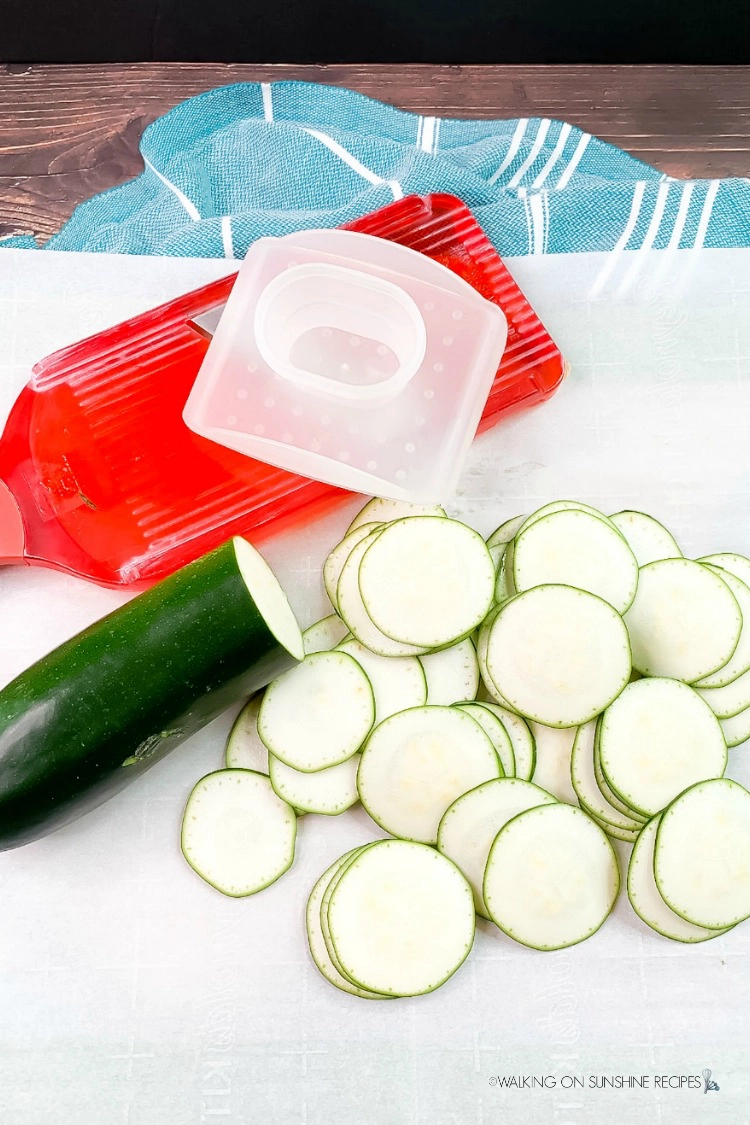 Sliced zucchini into rounds using a mandoline slicer from WOS