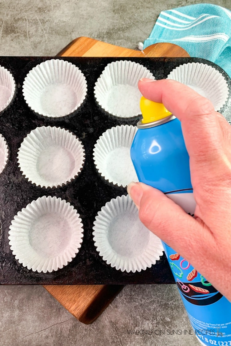 Spray muffin liners with non-stick cooking spray so the muffins don't stick. 