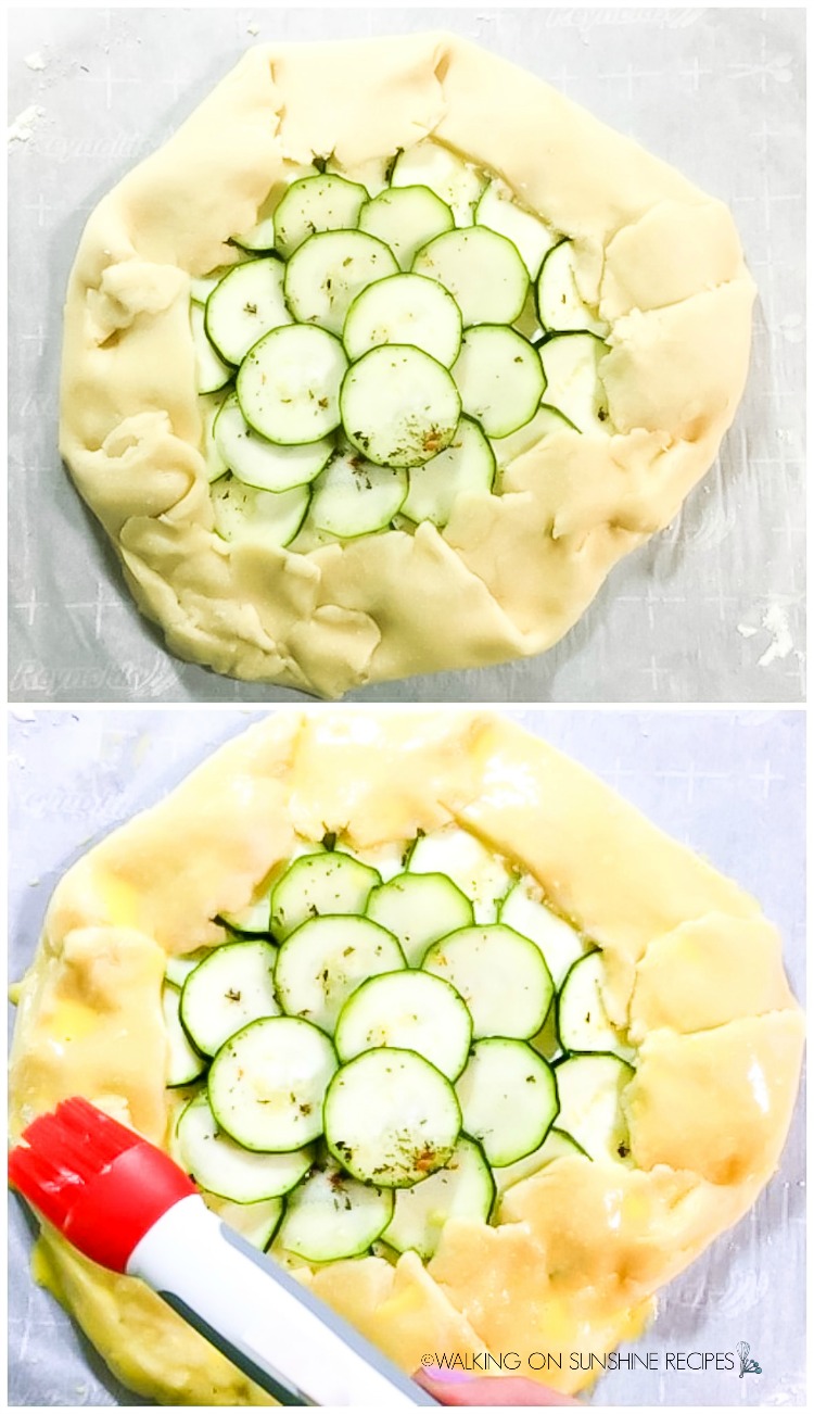 Fold the dough over the zucchini and brush with an egg wash.