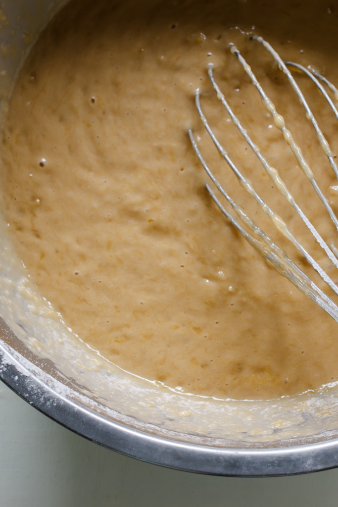 pumpkin donut cake batter in mixing bowl.