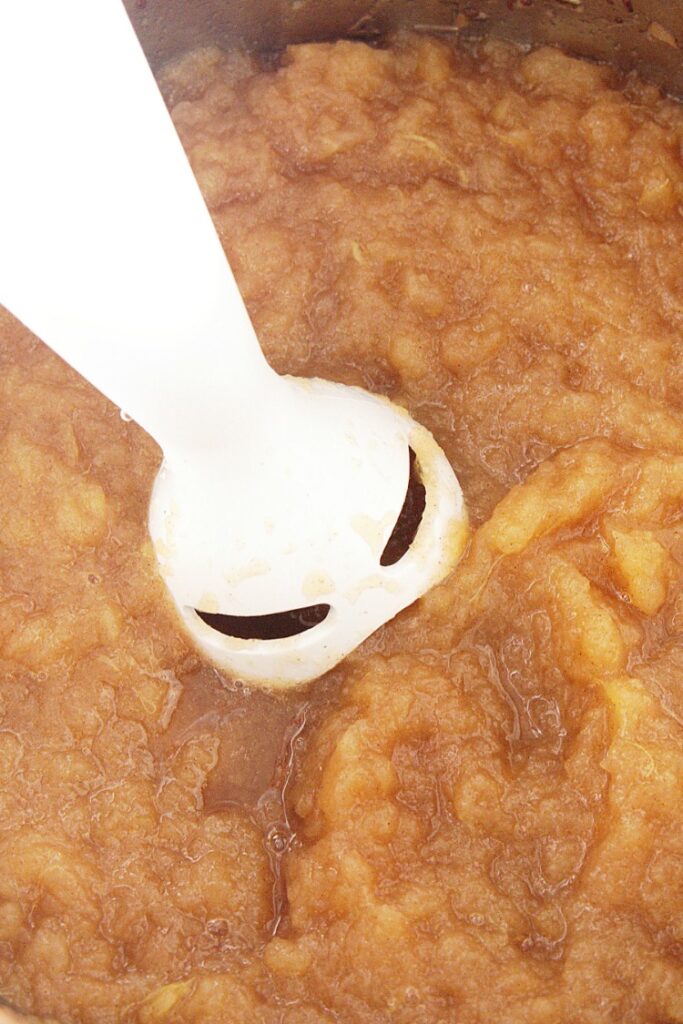 Use an immersion blender on homemade applesauce