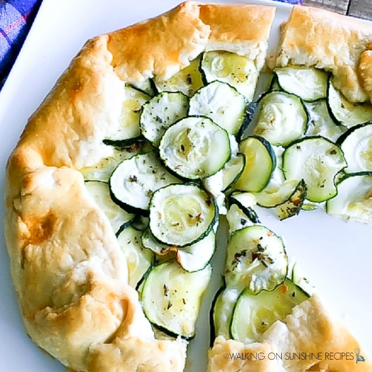Thinly sliced zucchini in homemade pastry dough with ricotta cheese and herbs. 