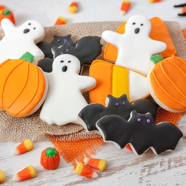 sugar cookies in shapes of bats, ghosts and pumpkins.