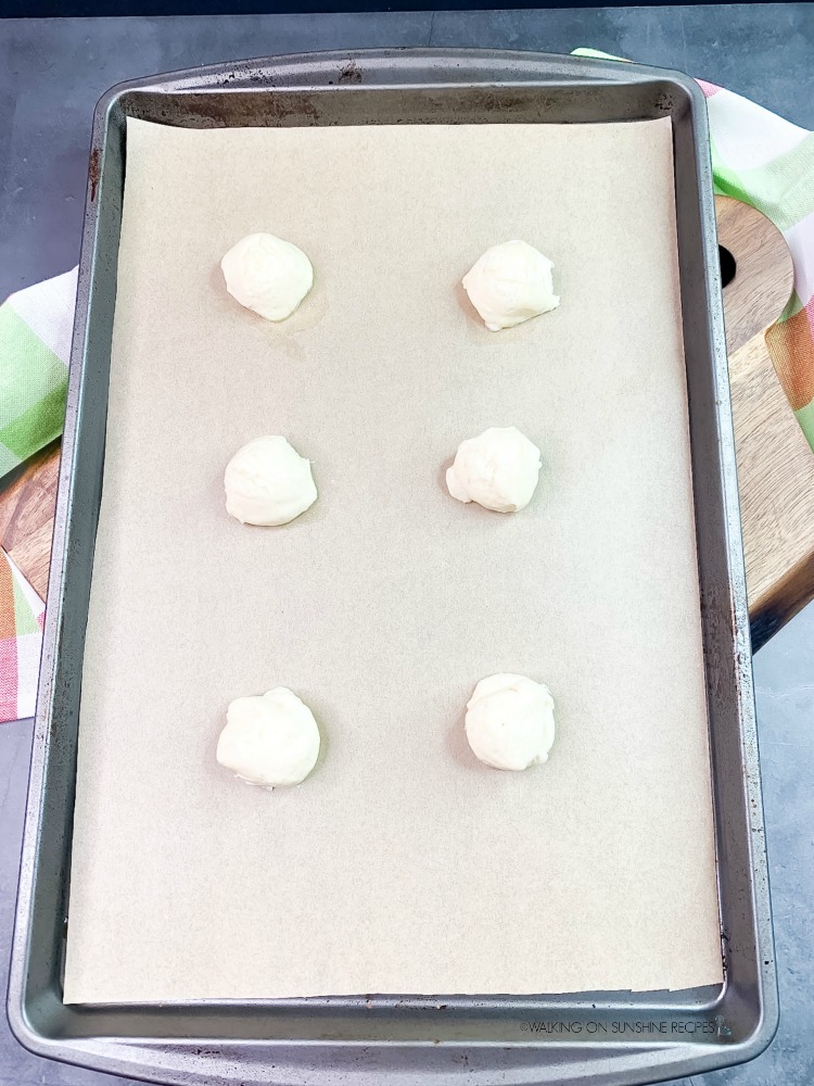 Place the cookies on a baking tray for White Cake Mix Christmas Cookies
