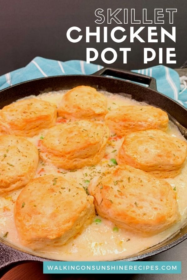 chicken pot pie with refrigerator biscuits baked in a cast iron skillet pan. 