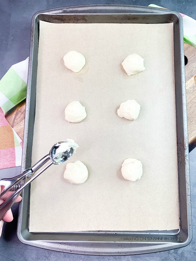 Use a cookie scoop to place the cookie dough on the baking tray