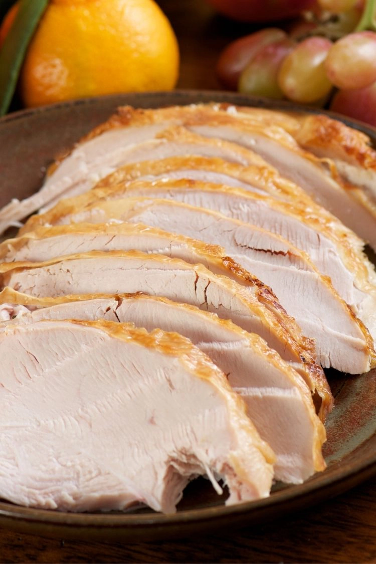 Sliced turkey on platter. 