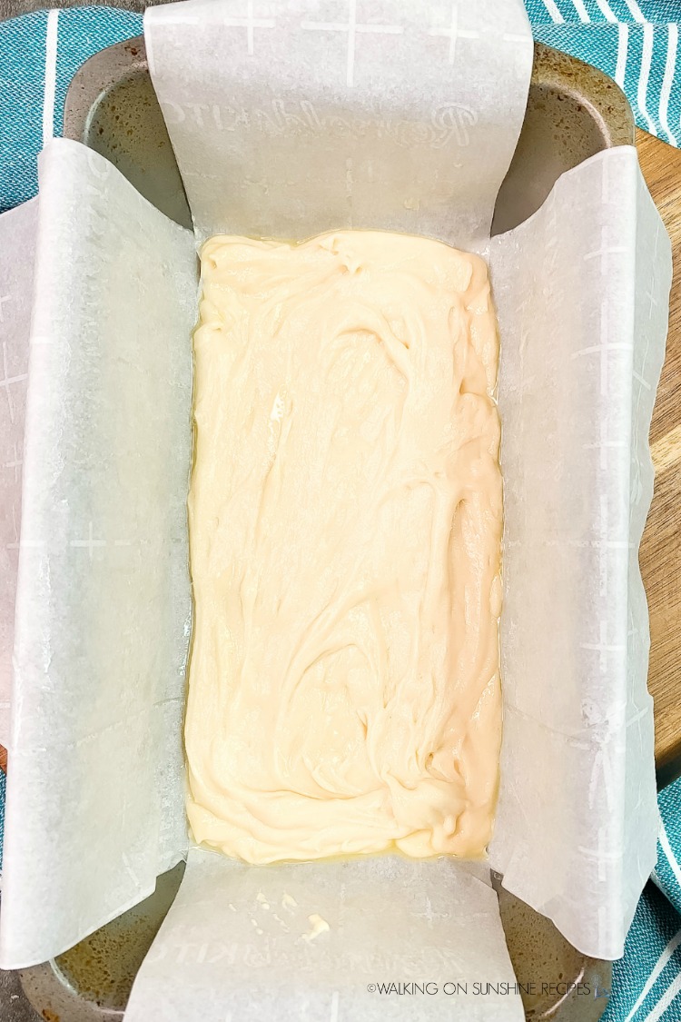 First layer of cake batter in loaf pan