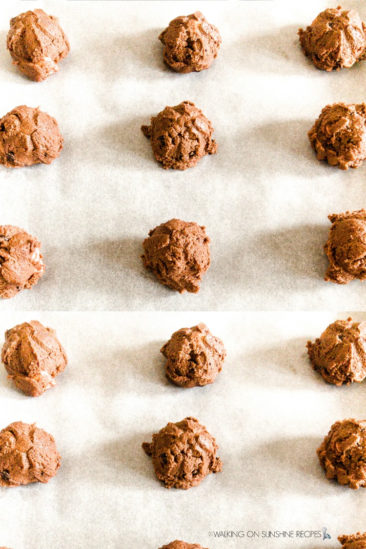 Mounds of Chocolate Marshmallow Cookies on baking tray before placing in oven.