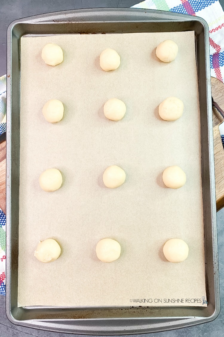 Place cookies on parchment lined baking tray