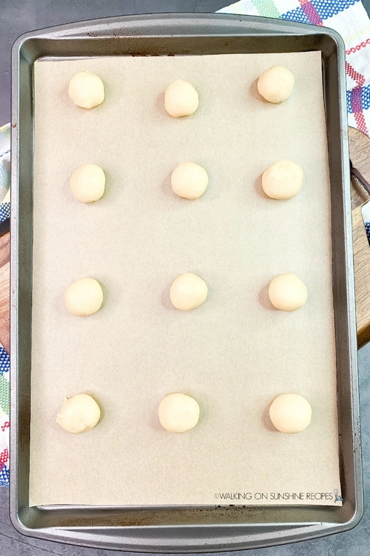 Place cookies on parchment lined baking tray