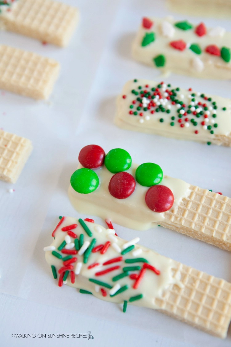 wafer sugar cookies with melted chocolate and sprinkles