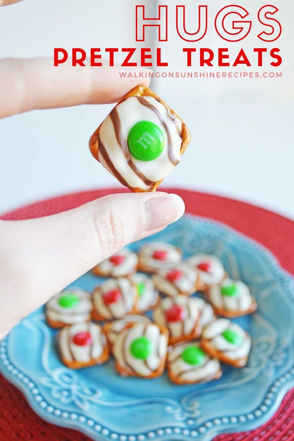 closeup of Hugs Pretzel Treats with M&M candy pieces. 