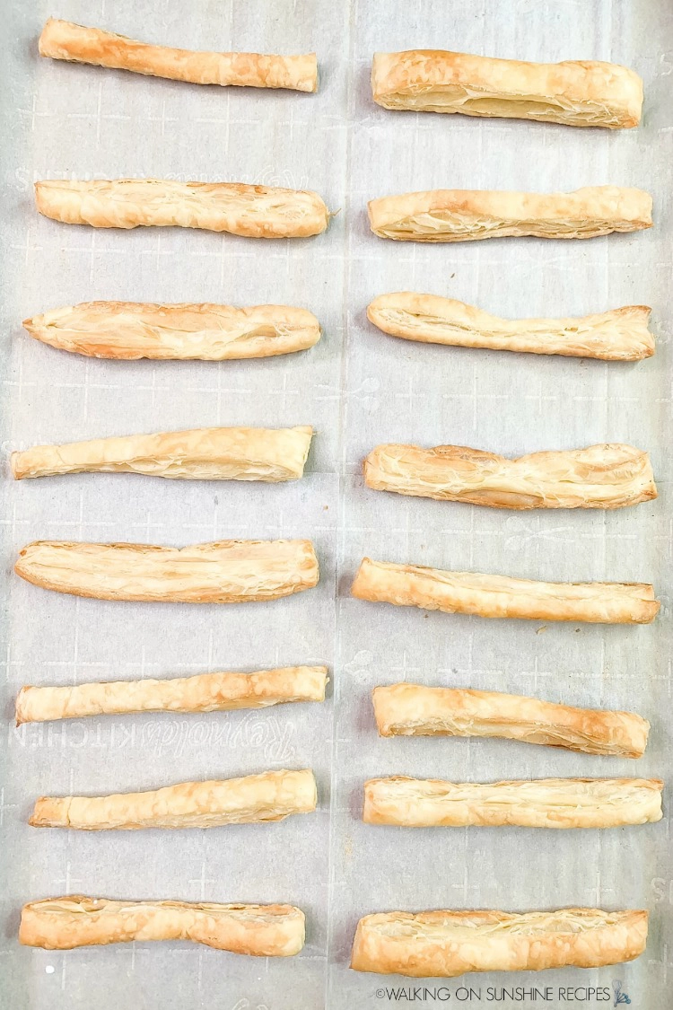 Baked Puff Pastry sticks on baking sheet