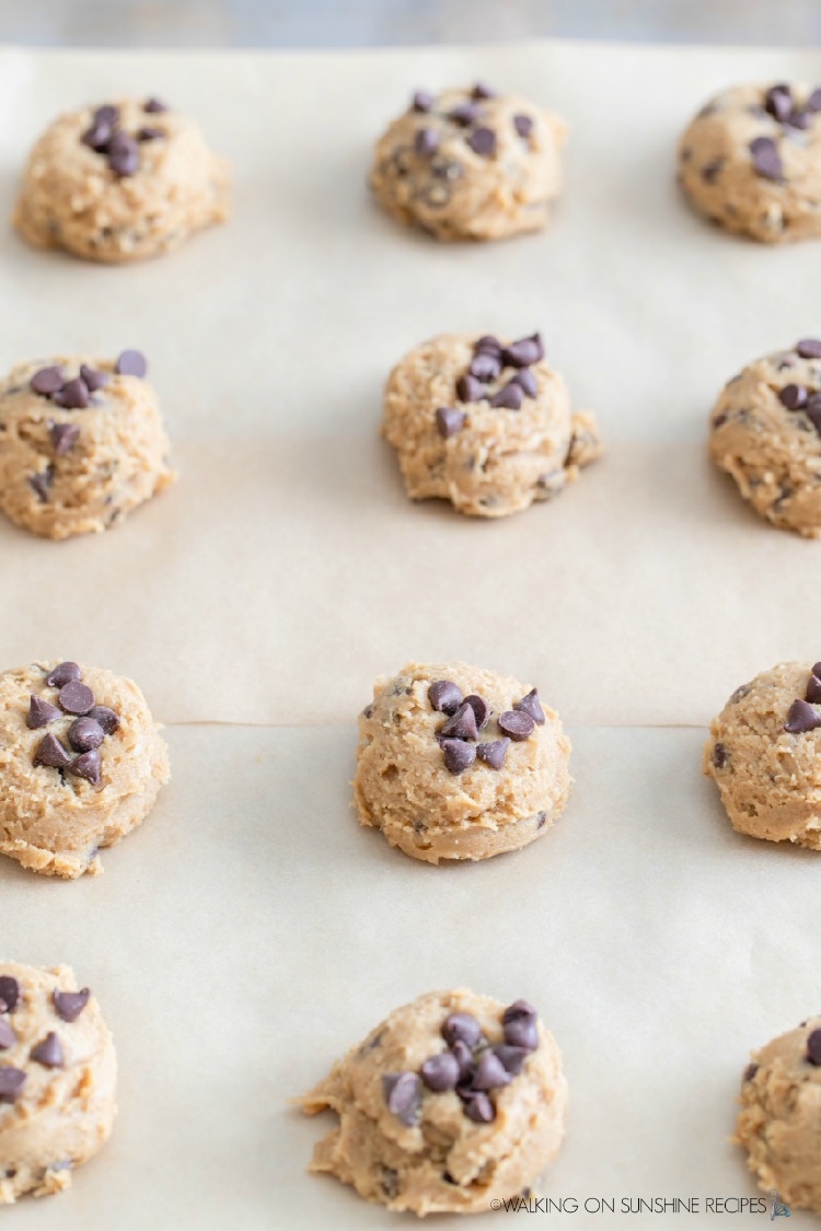 baking frozen cookie dough balls on baking tray.