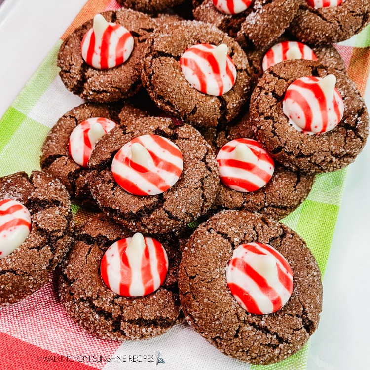 Chocolate sugar cookies with peppermint candy kisses in the center. 