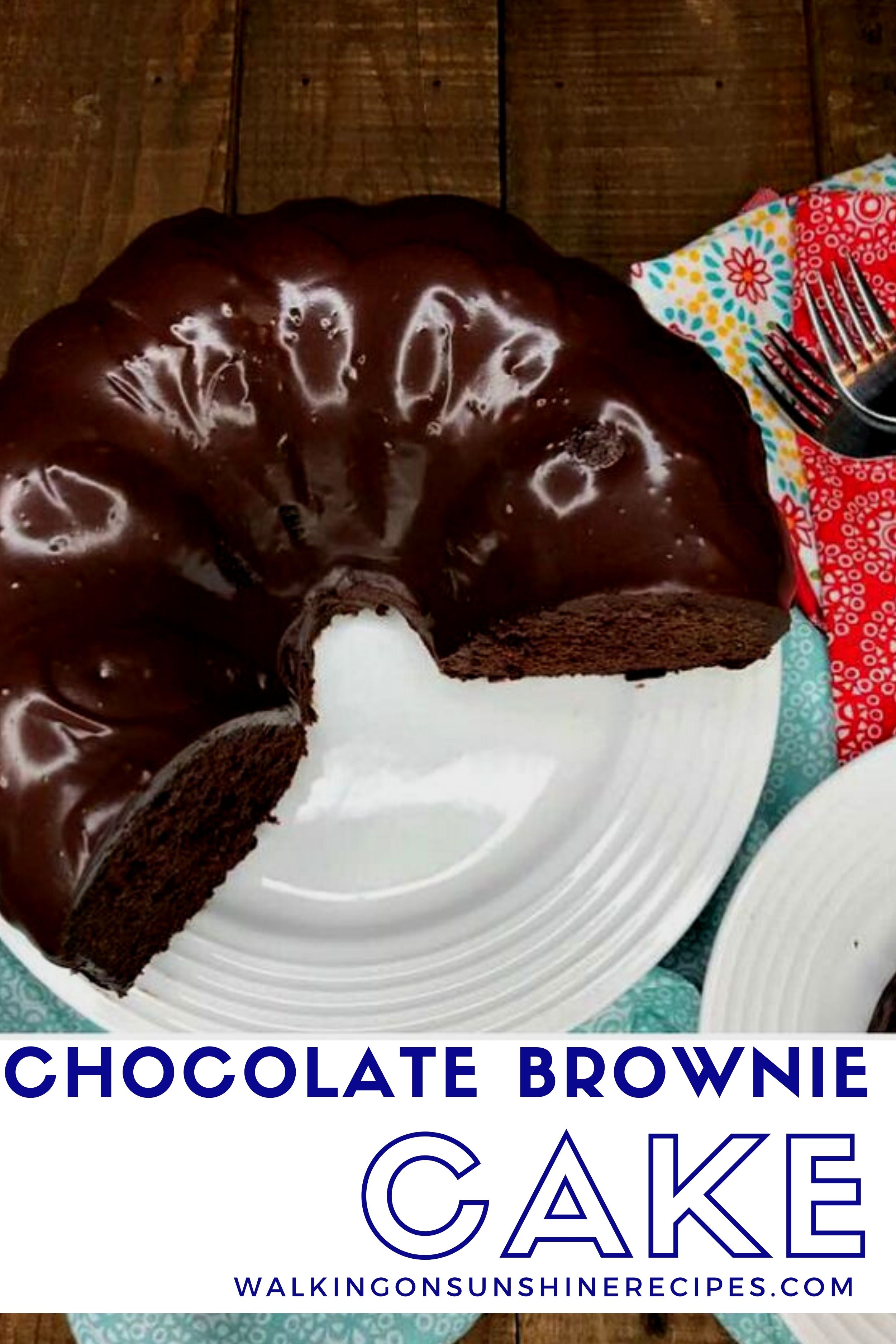 brownie cake on white plate with aqua napkin