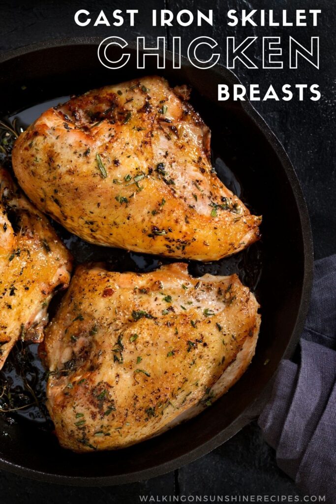 Perfectly cooked chicken breasts in a cast iron skillet pan. 