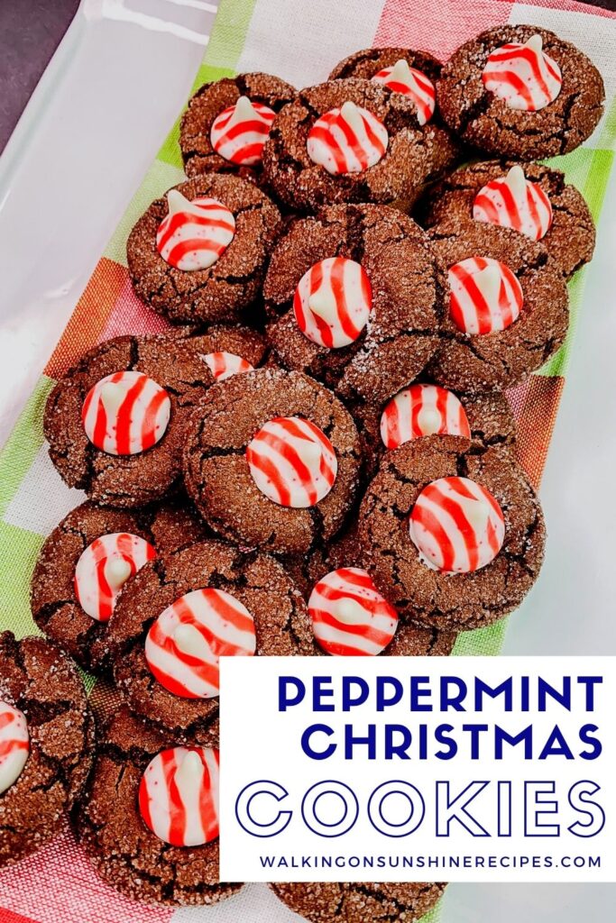 Peppermint blossom cookies on white plate with colorful napkin.