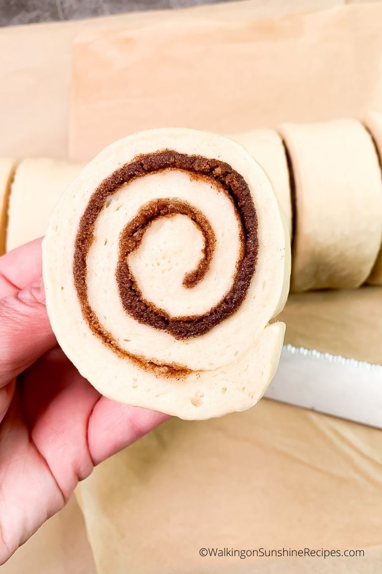 Close up of one cinnamon roll with dough made in a bread machine. 