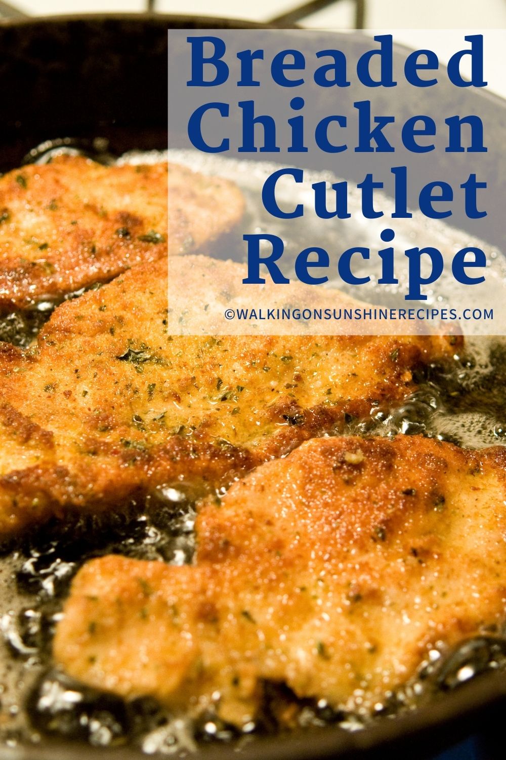 Italian chicken cutlets in frying pan. 