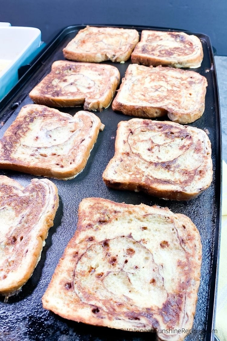 Perfectly baked Cinnamon Roll French Toast on electric skillet