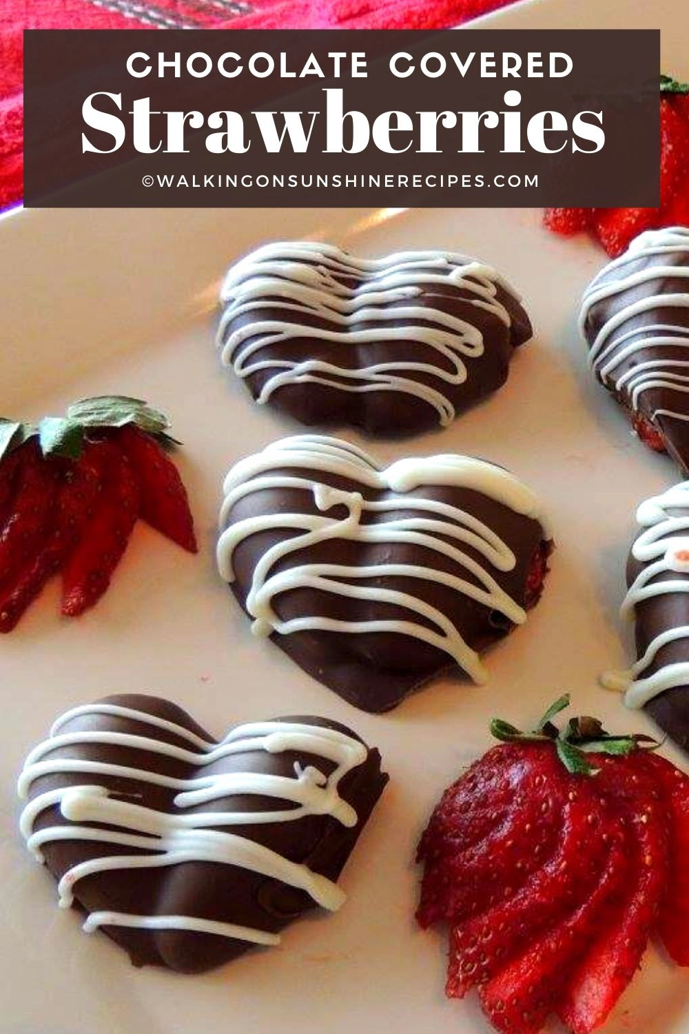 strawberry hearts decorated for Valentine's Day with melted chocolate. 