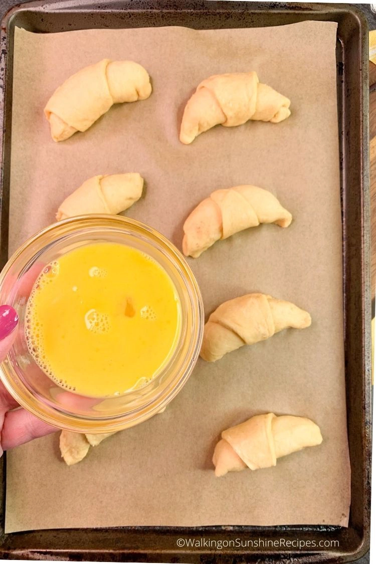 brush the crescent rolls with an egg wash. 