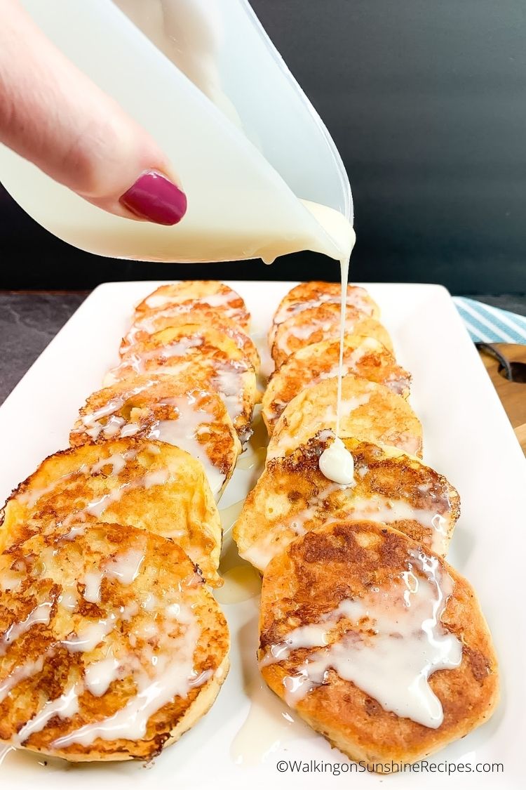 Drizzle icing over Cinnamon Roll French Toast.