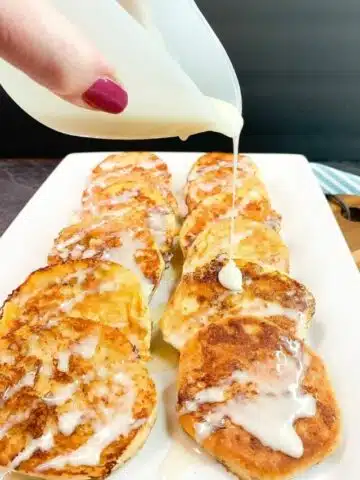 cropped-Pour-Icing-on-top-of-French-Toast-Cinnamon-Rolls.jpg