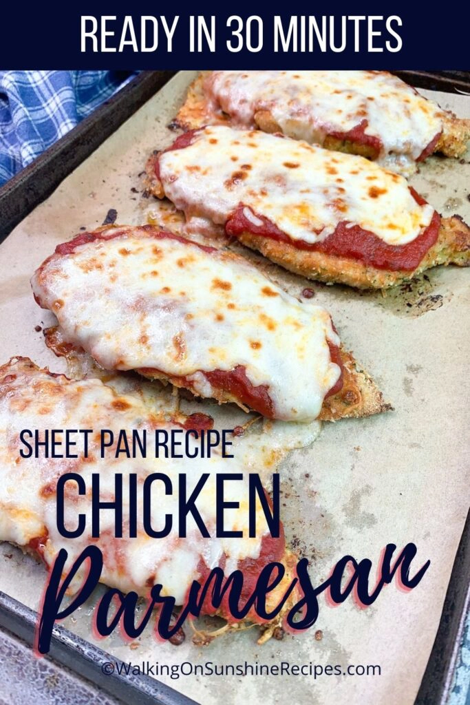 Baked chicken cutlet Parmesan on sheet pan. 