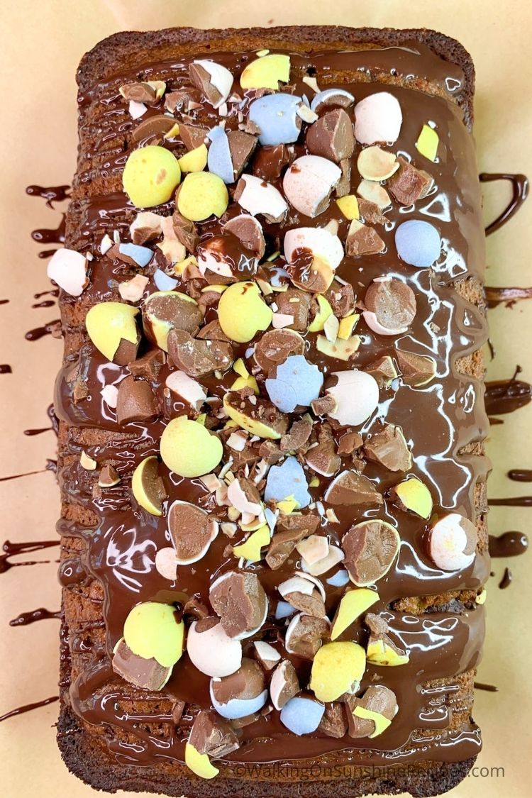 Banana bread with melted chocolate and crushed candy pieces. 