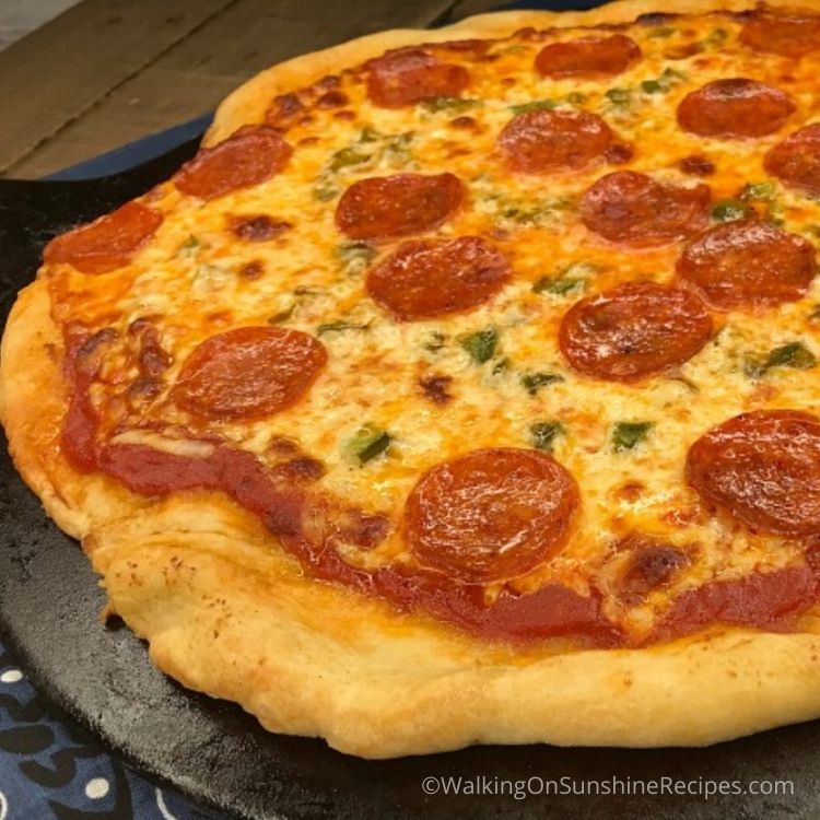 beer pizza dough cooked on pizza stone.