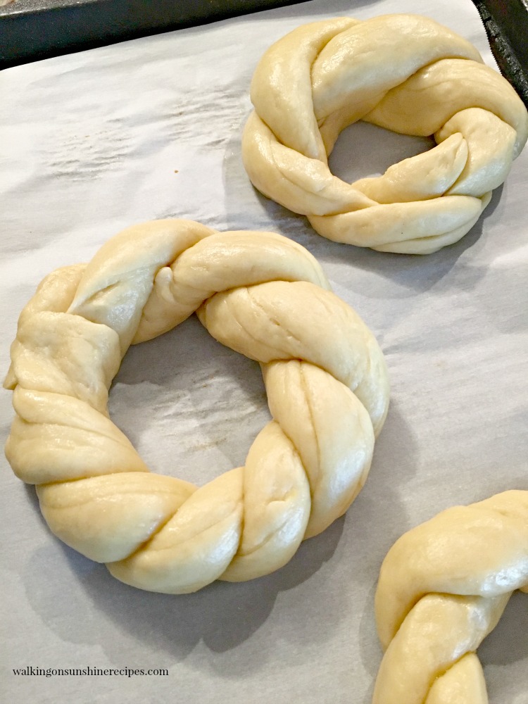 Bread dough wreaths before baking. 