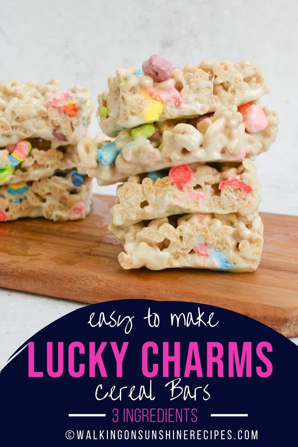 Lucky Charms Cereal Bars on wooden board. 