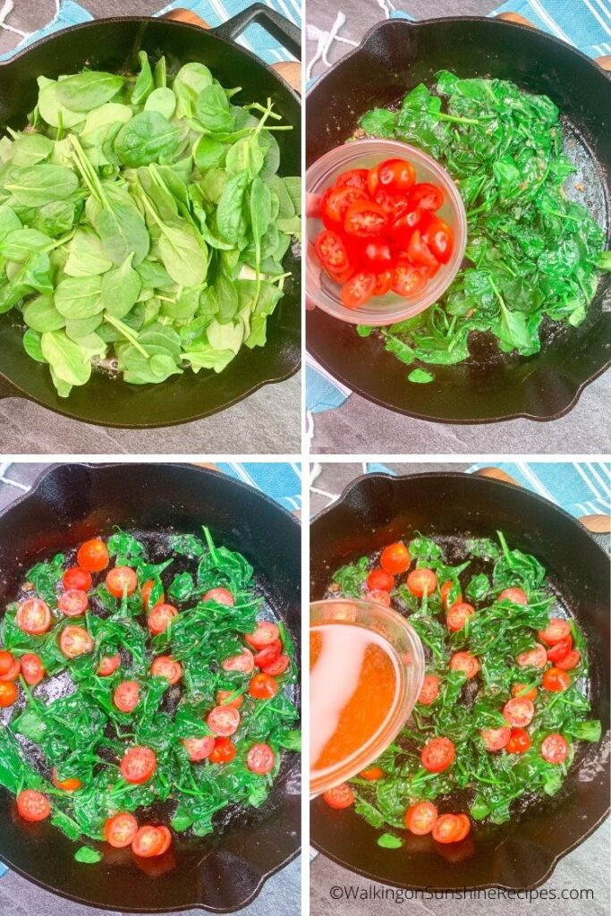 Spinach and tomatoes in cast iron skillet. 