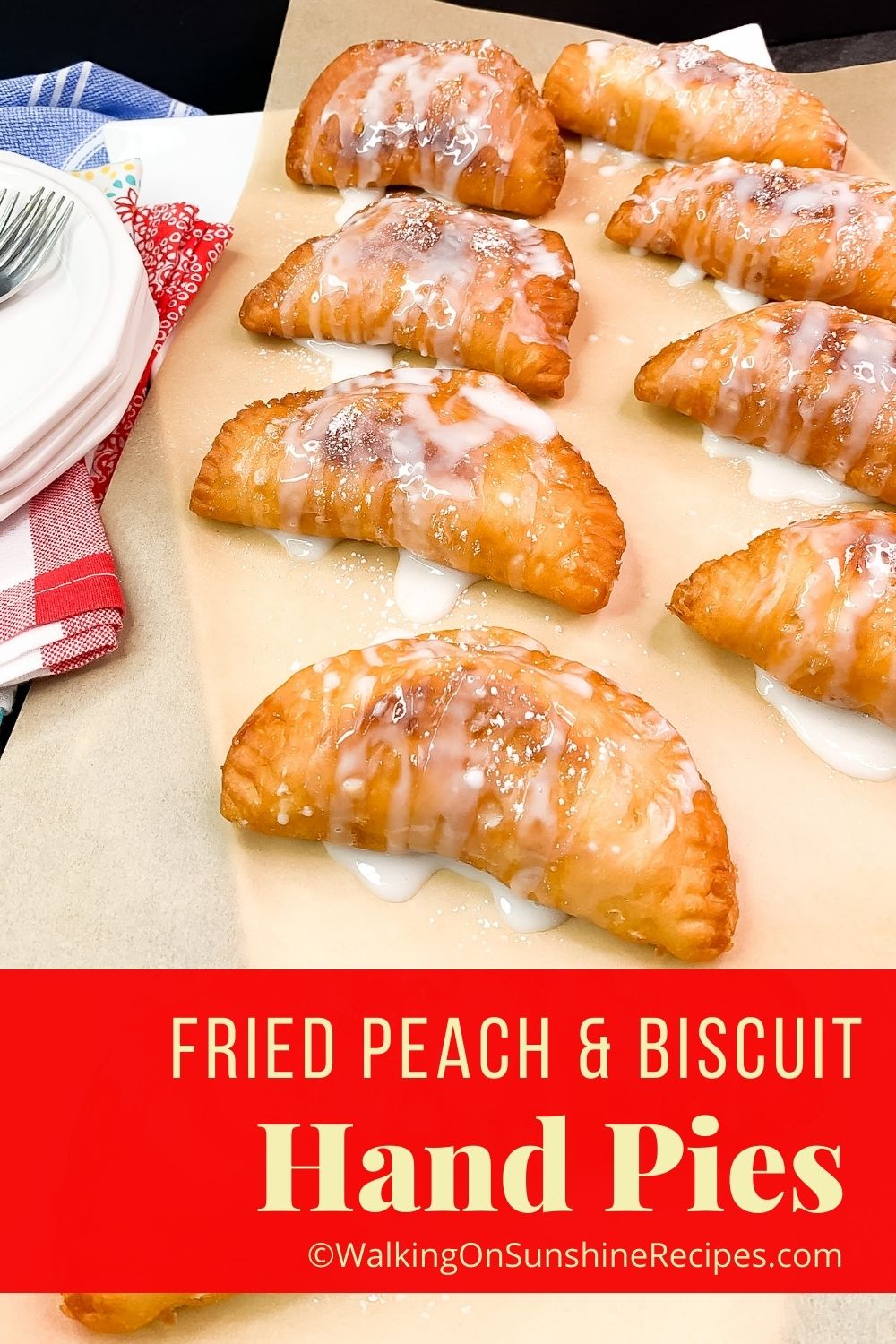 fried hand pies on parchment paper with glaze. 