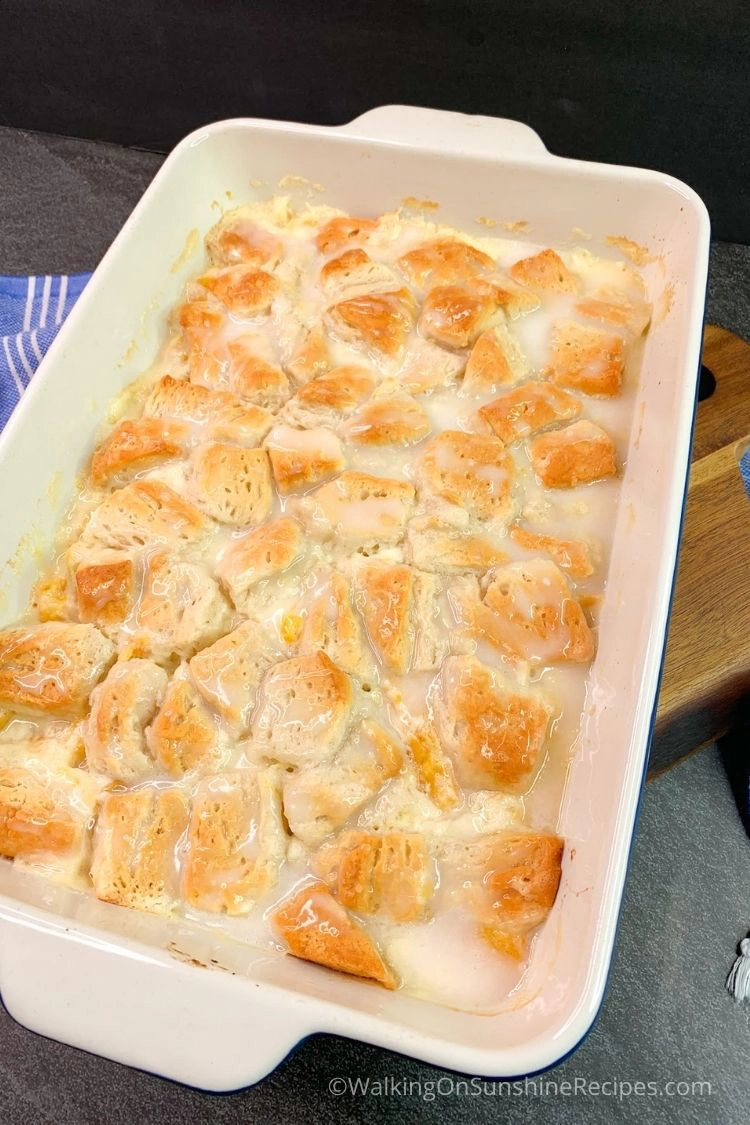 peach cobbler rolls in baking dish ready to serve. 