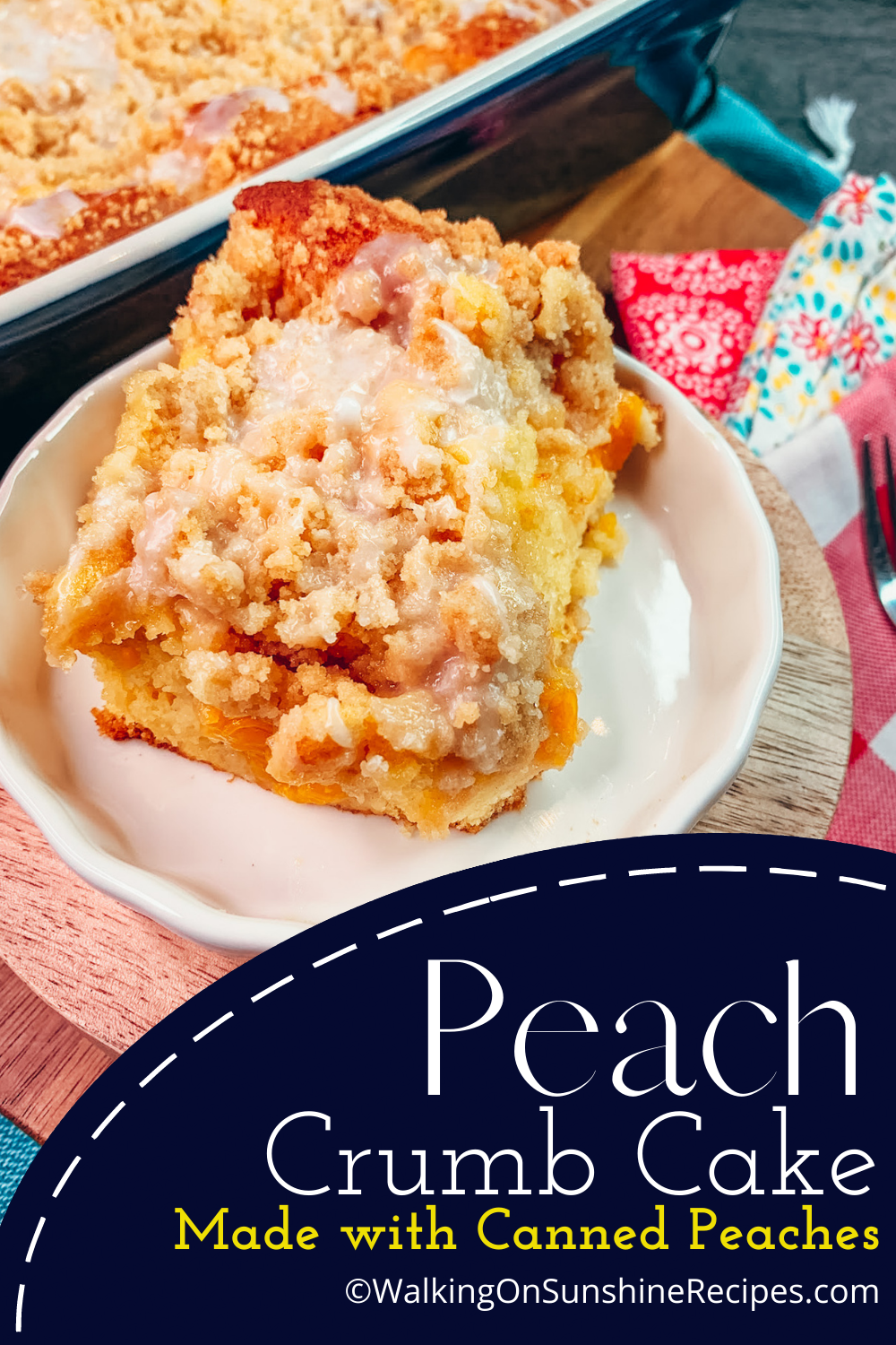 Peach crumb cakes sliced and served on white plate. 