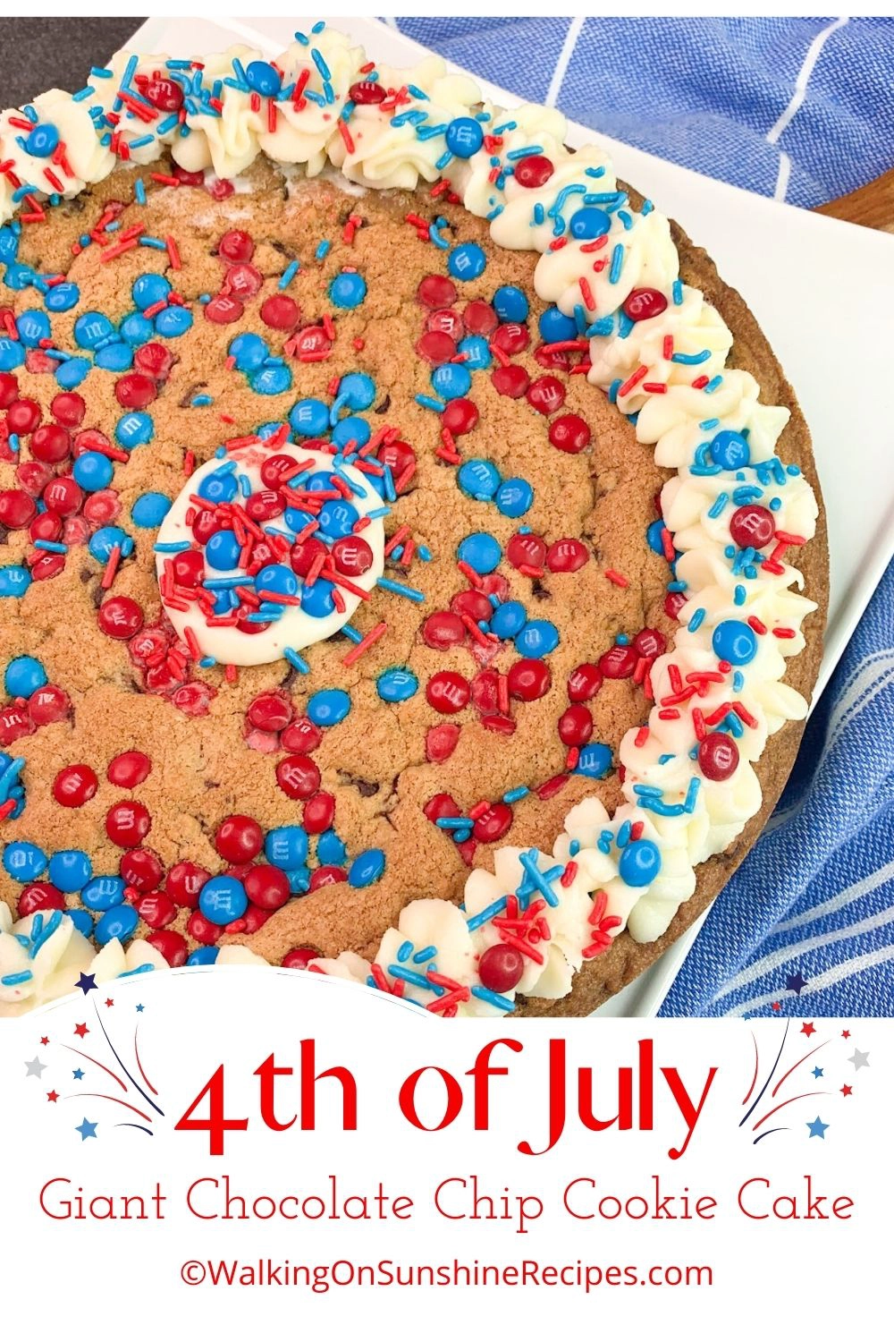 full sized chocolate chip cookie cake decorated in red, white and blue. 