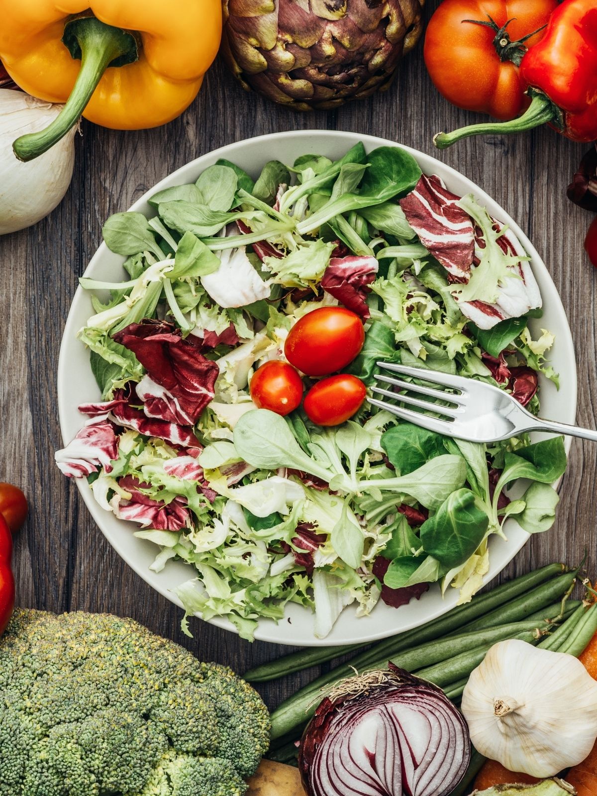 green lettuce salad with grape tomatoes.