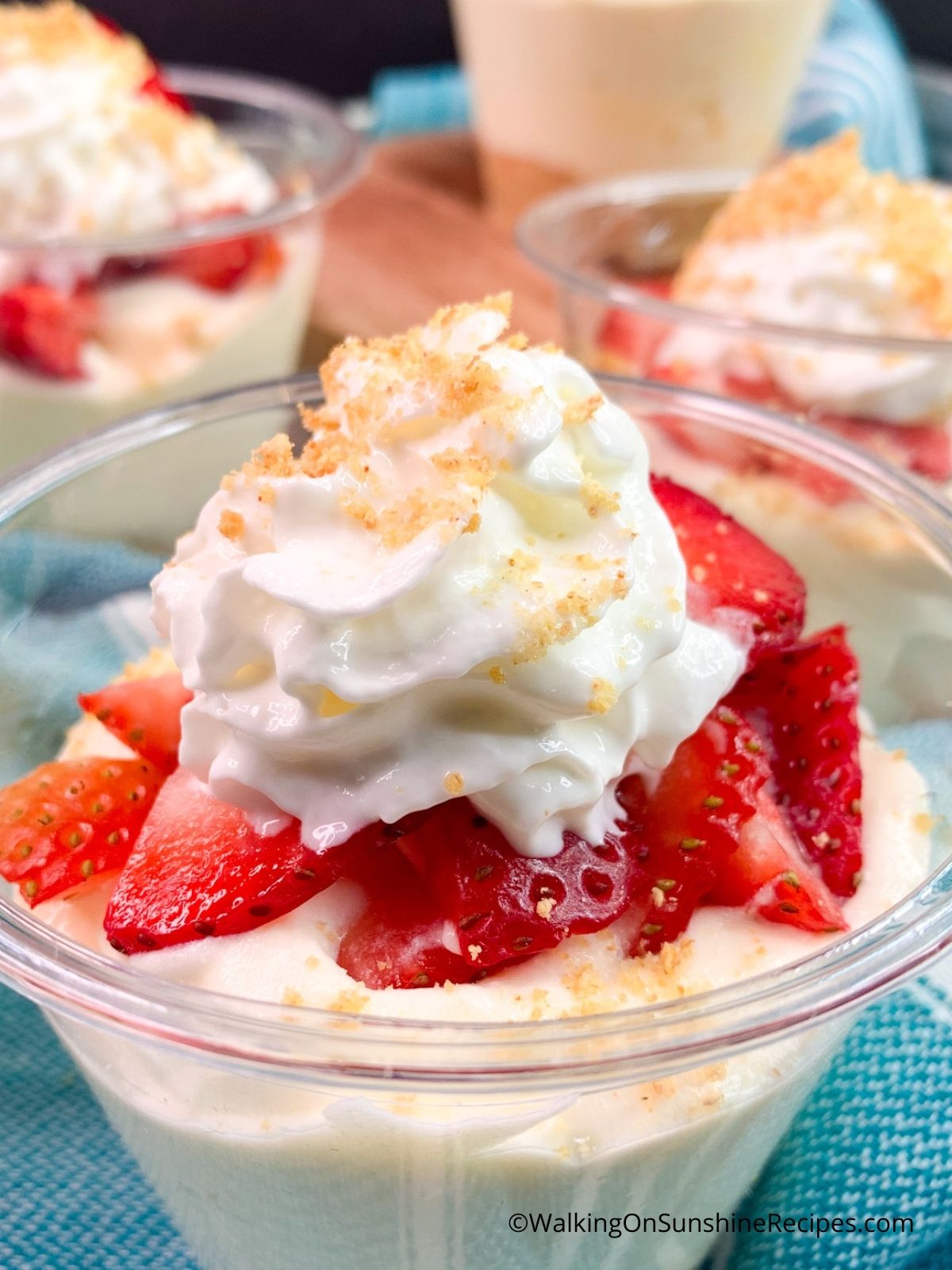 closeup of strawberry cheesecake pudding cups. 