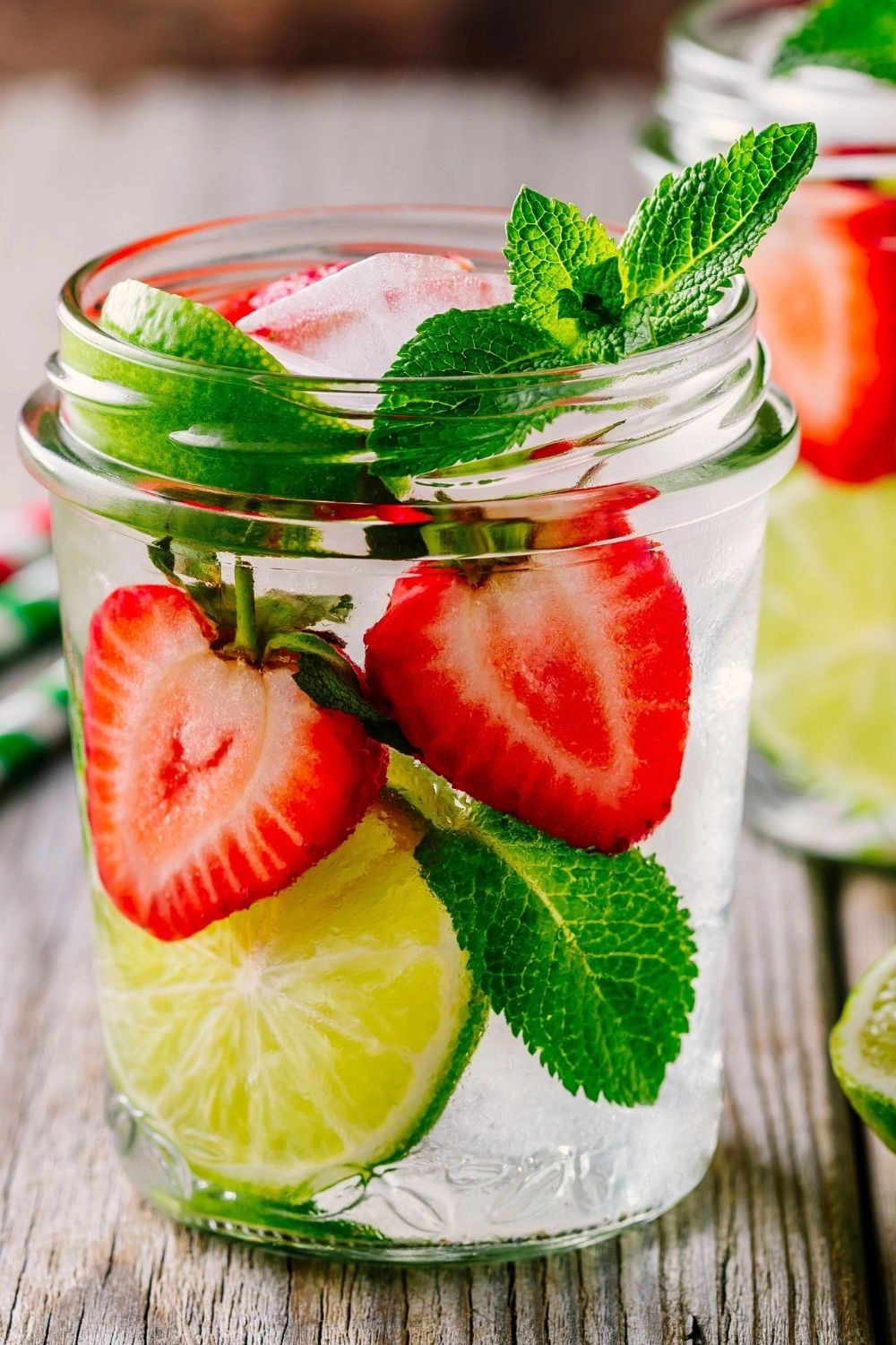 Infused water with strawberries and lime slices.