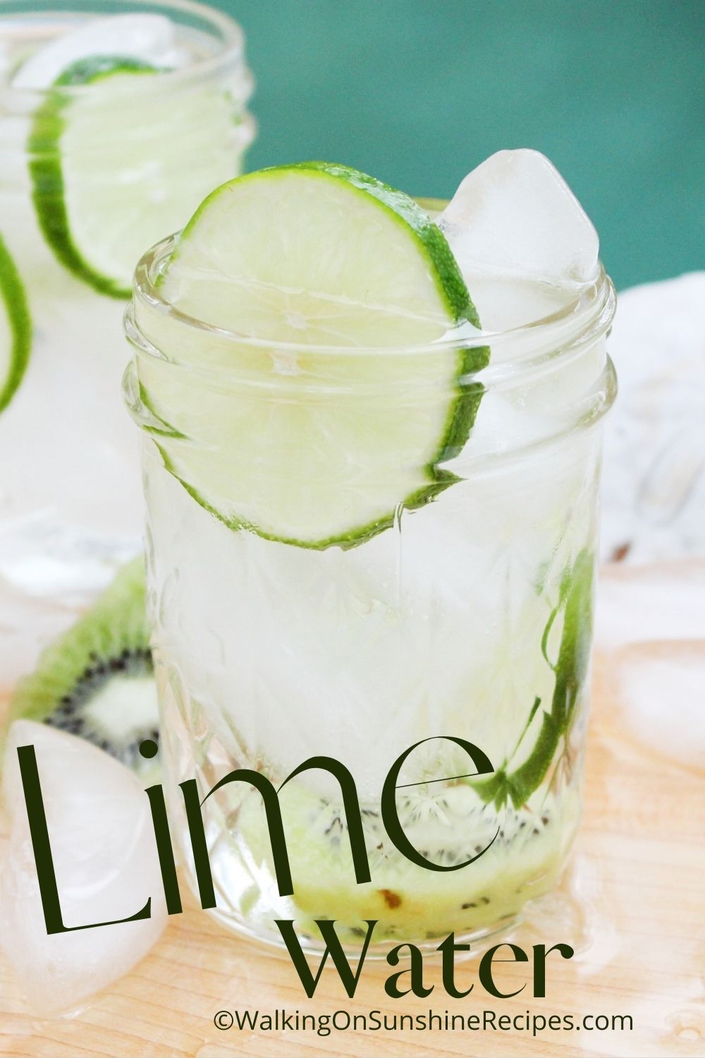 Lime slices in water with ice. 
